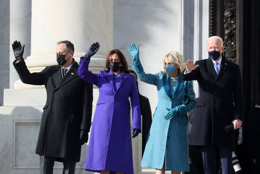 WASHINGTON, DC - JANUARY 20: (L-R) Doug Emhoff, U.S. Vice President-elect Kamala Harris, Jill Biden and President-elect Joe Biden wave as they arrive on the East Front of the U.S. Capitol for the inauguration on January 20, 2021 in Washington, DC. During today's inauguration ceremony Joe Biden becomes the 46th president of the United States. (Photo by Joe Raedle/Getty Images)