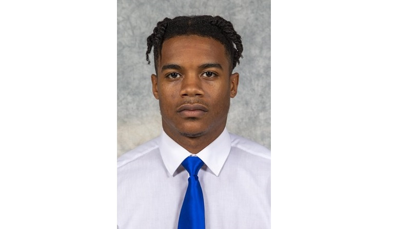 Noah Green is said to be the suspect in the attack outside the U.S. Capitol that killed one police officer and wounded another after ramming them with a vehicle at a security checkpoint barricade. In this photo, Green is wearing a white button up shirt, royal blue tie in a football roster photo for CNU in Virginia. 