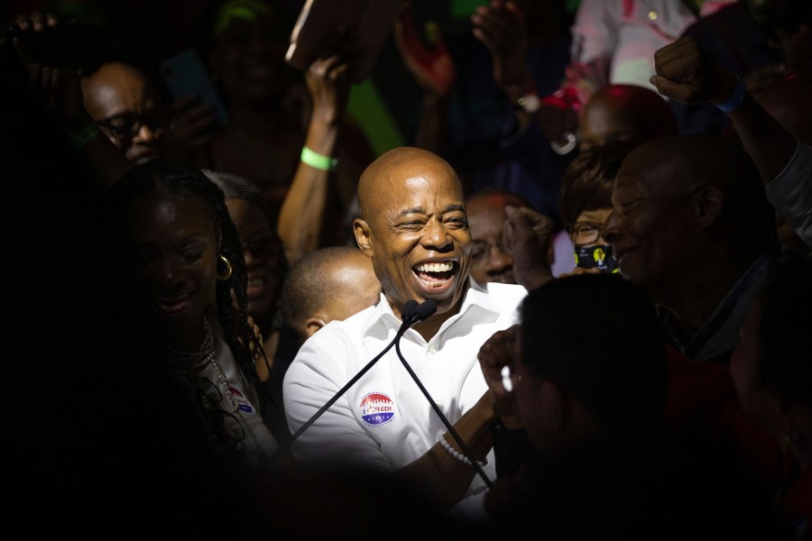 Mayoral candidate Eric Adams mingles with supporters during his election night party, late Tuesday, June 22, 2021, in New York. (AP Photo/Kevin Hagen)