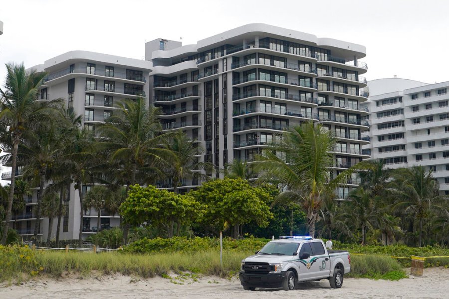 The sister building of the condominium that partially collapsed in Surfside, Fla. This building, erected a year later by the same company, using the same materials and a similar design, has faced the same tides and salty air as the building that collapsed. (AP Photo/Wilfredo Lee, File)