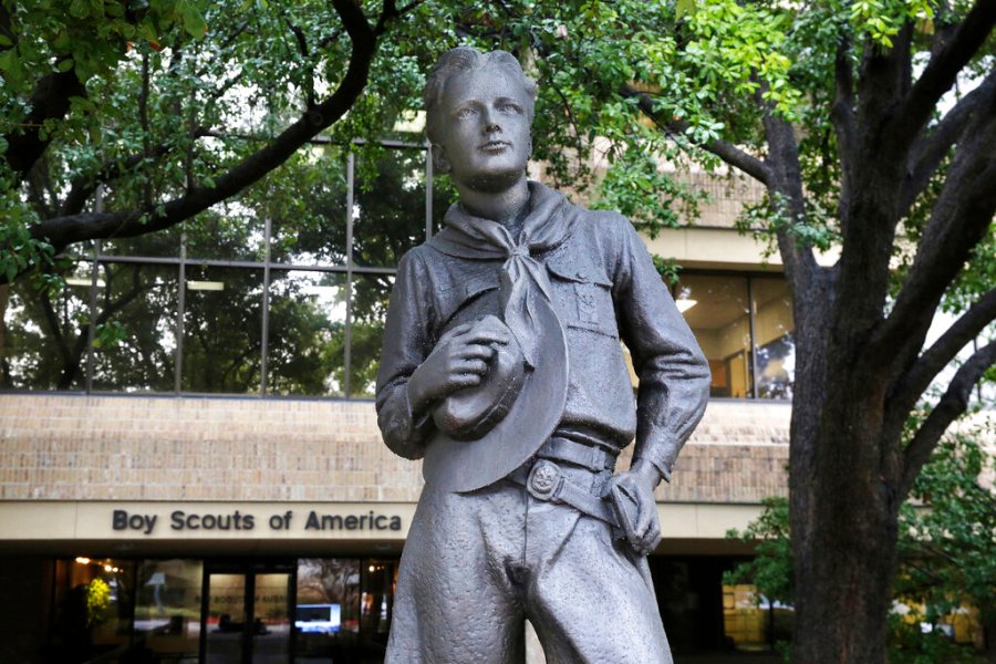 A statue stands outside the Boy Scouts of America headquarters in Irving, Texas. The Boy Scouts of America have reached an agreement with attorneys representing some 60,000 victims of child sex abuse in what could prove to be a pivotal moment in the organization’s bankruptcy case. Attorneys for the BSA filed court papers late Thursday, July 1, 2021 outlining a restructuring support agreement, or RSA, with attorneys representing abuse victims. (AP Photo/LM Otero, File)