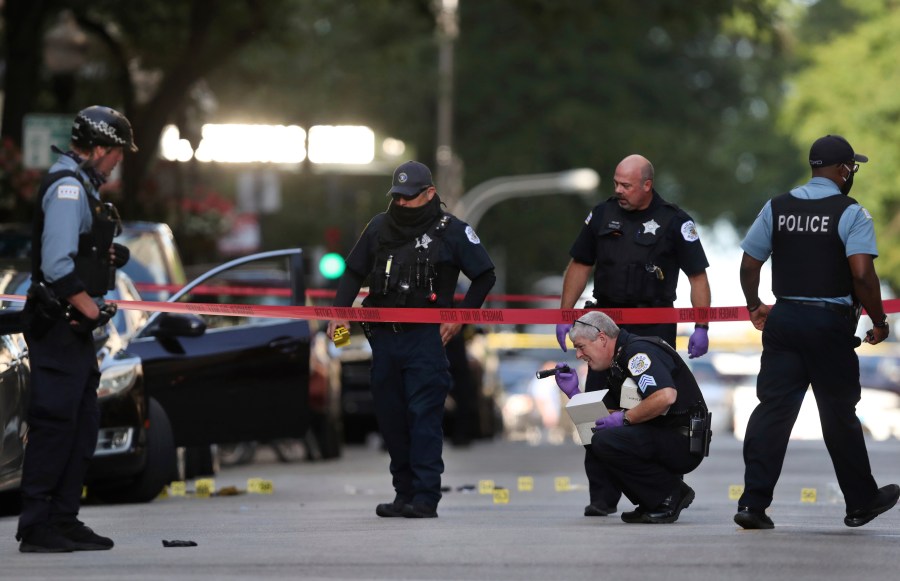 Chicago police investigate the scene of a shooting.