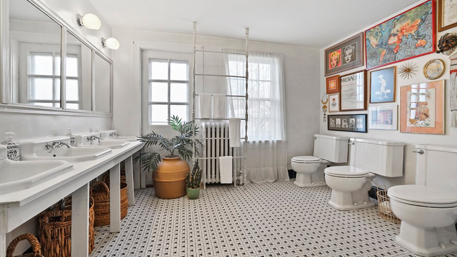 Listing agent Jane Dichristopher explains why the home was once updated with a quadruple-toileted   bathroom.