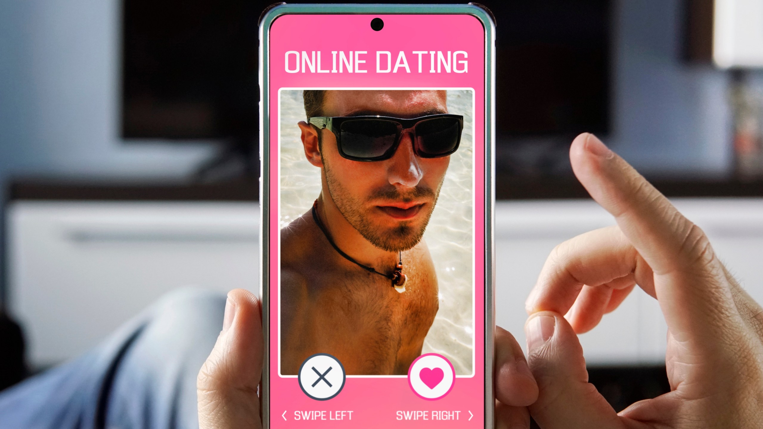 Young man on dating app wearing sunglasses