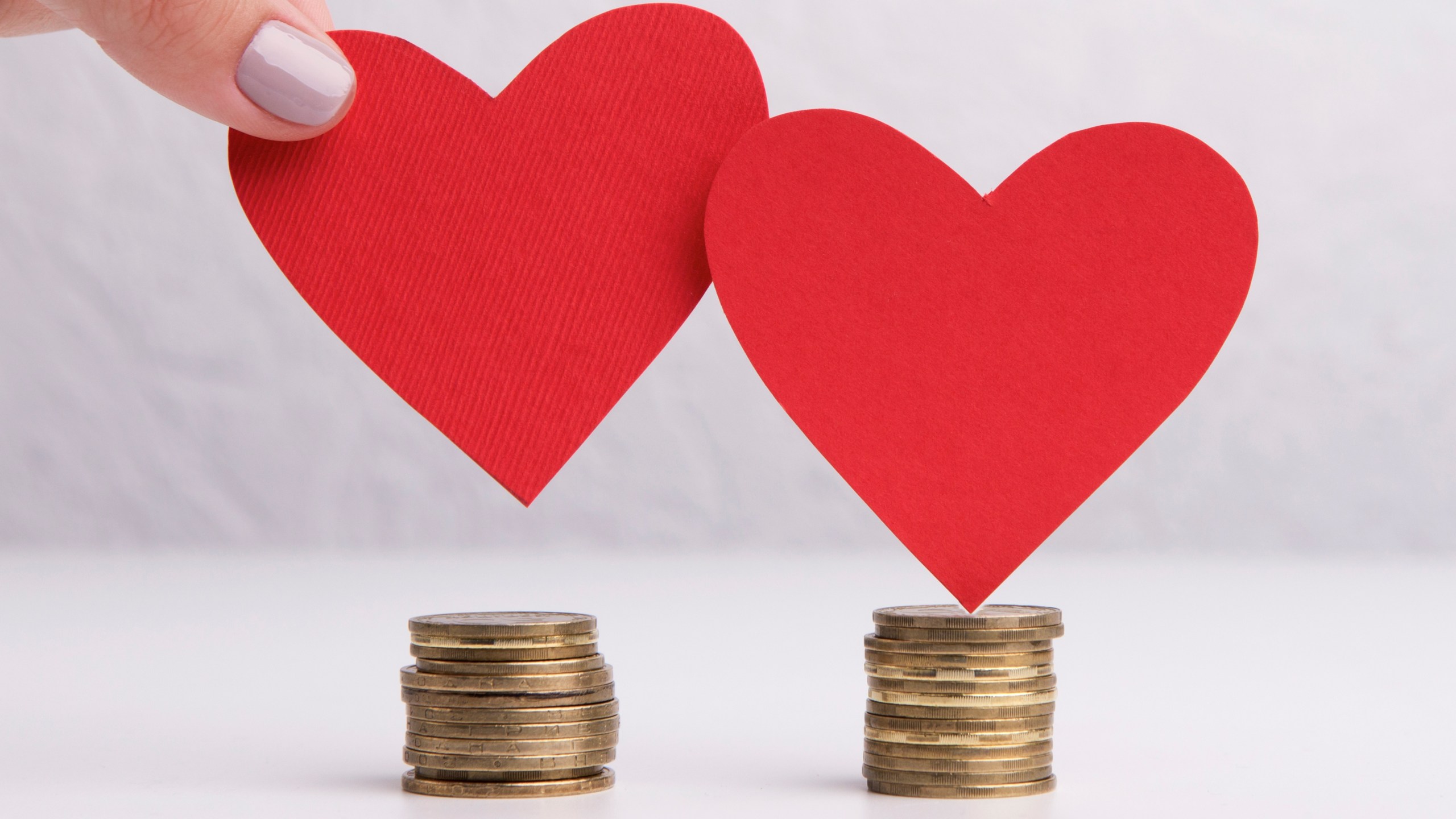 Creative red hearts and money savings for wedding concept - stock photo