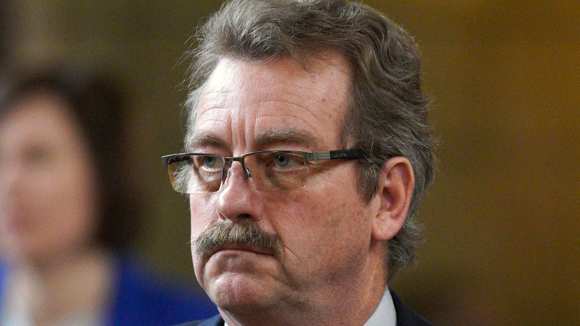 FILE - Nebraska state Sen. Bruce Bostelman, of Brainard, is seen in the Legislative Chamber in Lincoln, Neb., Friday, March 1, 2019. Bostelman has apologized after he publicly cited a persistent but debunked rumor alleging that schools are placing litter boxes in school bathrooms to accommodate children who self-identify as cats. (AP Photo/Nati Harnik, File)