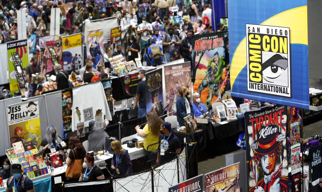 Comic-Con attendees peruse the aisles of the convention show floor during Preview Night at the 2022 Comic-Con International at the San Diego Convention Center, Wednesday, July 20, 2022, in San Diego. (AP Photo/Chris Pizzello)