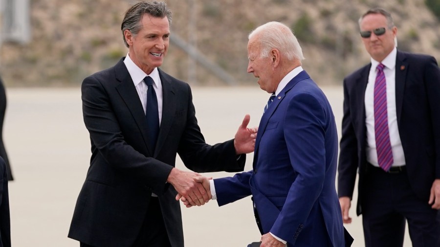 California Gov. Gavin Newsom greets President Biden upon his arrival at Los Angeles International Airport