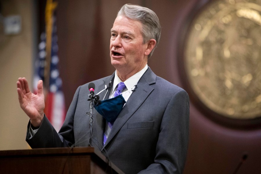 FILE - Idaho Gov. Brad Little gestures during a press conference at the Statehouse in Boise, Idaho, on Oc. 1, 2020. Little has signed a bill criminalizing gender-affirming medical care for transgender youth on Tuesday, April 4, 2023. (Darin Oswald/Idaho Statesman via AP, File)