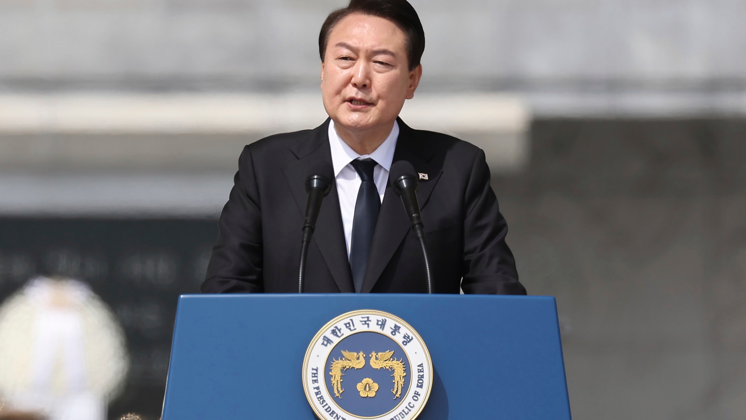 FILE - South Korean President Yoon Suk Yeol speaks during a ceremony to commemorate South Korean soldiers killed in three major clashes with North Korea in the West Sea in past years, at the national cemetery in Daejeon, South Korea, Friday, March 24, 2023. Leaders of the U.S. Congress have invited Yoon to address a joint meeting during a visit to Washington later this month. (Im Hun-jung/Yonhap via AP, File)