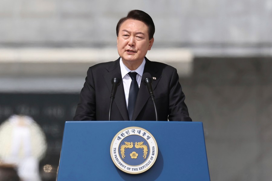 FILE - South Korean President Yoon Suk Yeol speaks during a ceremony to commemorate South Korean soldiers killed in three major clashes with North Korea in the West Sea in past years, at the national cemetery in Daejeon, South Korea, Friday, March 24, 2023. Leaders of the U.S. Congress have invited Yoon to address a joint meeting during a visit to Washington later this month. (Im Hun-jung/Yonhap via AP, File)