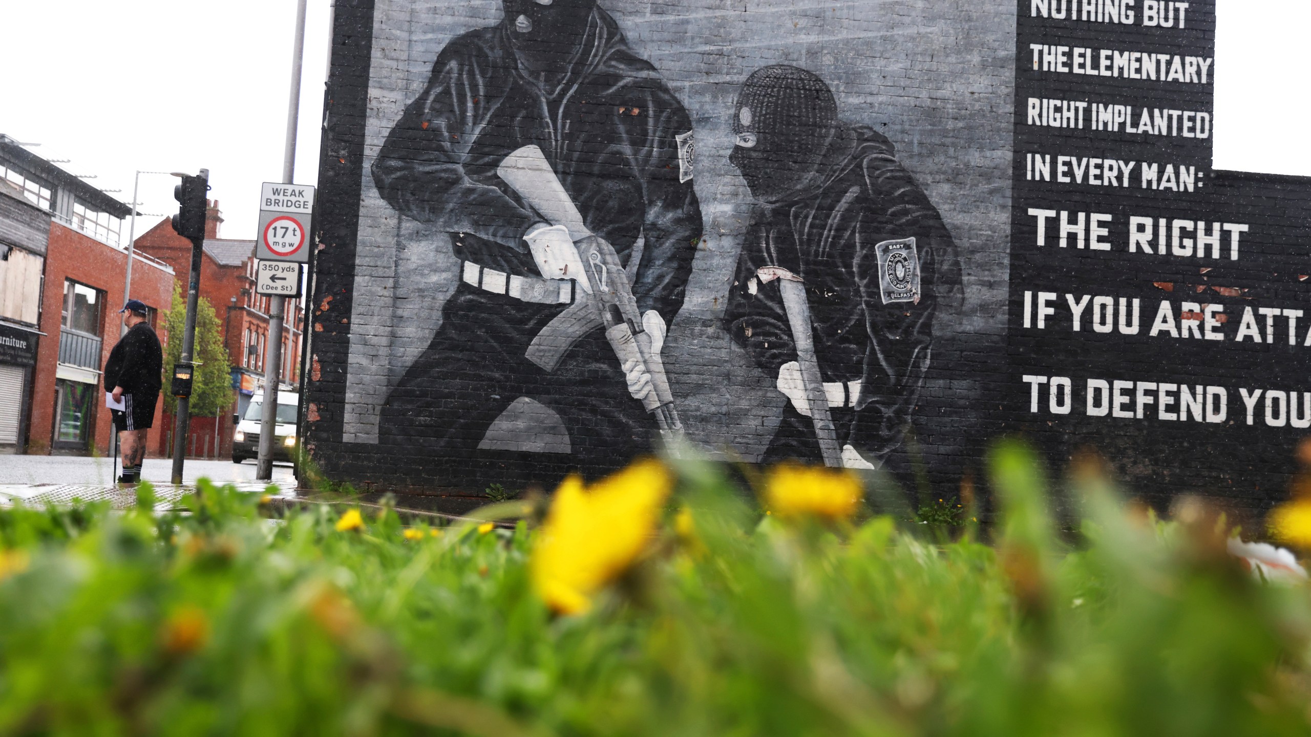 A loyalist mural is seen on a wall in east Belfast, Northern Ireland, Wednesday, April 5, 2023. It has been 25 years since the Good Friday Agreement largely ended a conflict in Northern Ireland that left 3,600 people dead. (AP Photo/Peter Morrison)