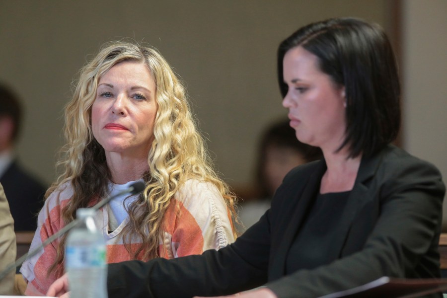 FILE - Lori Vallow Daybell glances at the camera during her hearing in Rexburg, Idaho., on March 6, 2020. The investigation started roughly 29 months ago with two missing children. It soon grew to encompass five states, four suspected murders and claims of an unusual, doomsday-focused religious beliefs involving "dark spirits" and "zombies." On Monday, April 10, 2023, an Idaho jury will begin the difficult task of deciding the veracity of those claims and others in the triple murder trial of Lori Vallow Daybell. (John Roark/The Idaho Post-Register via AP, Pool, File)