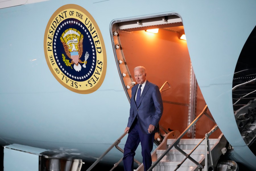 President Joe Biden steps off Air Force One at Belfast International Airport in Belfast, Northern Ireland, Tuesday, April 11, 2023. Biden is visiting the United Kingdom and Ireland in part to help celebrate the 25th anniversary of the Good Friday Agreement. (AP Photo/Patrick Semansky)