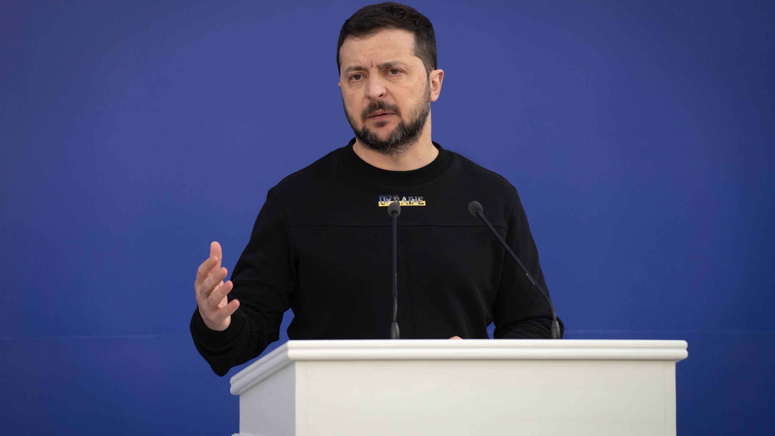 Ukrainian President Volodymyr Zelenskyy addresses the audience before an Iftar dinner celebrating Islam's holy month of Ramadan in a Muslim center outside Kyiv, Ukraine, Friday, April 7, 2023. (AP Photo/Efrem Lukatsky)