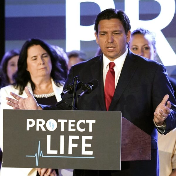 FILE - Florida Gov. Ron DeSantis speaks to supporters before signing a 15-week abortion ban into law Thursday, April 14, 2022, in Kissimmee, Fla. DeSantis signed into law one of the nation's toughest abortion bans late Thursday, April 11, 2023. If the courts ultimately allow the new measure to take effect, it will soon be illegal for Florida women to obtain an abortion after six weeks of pregnancy, which is before most realize they're pregnant. (AP Photo/John Raoux, File)