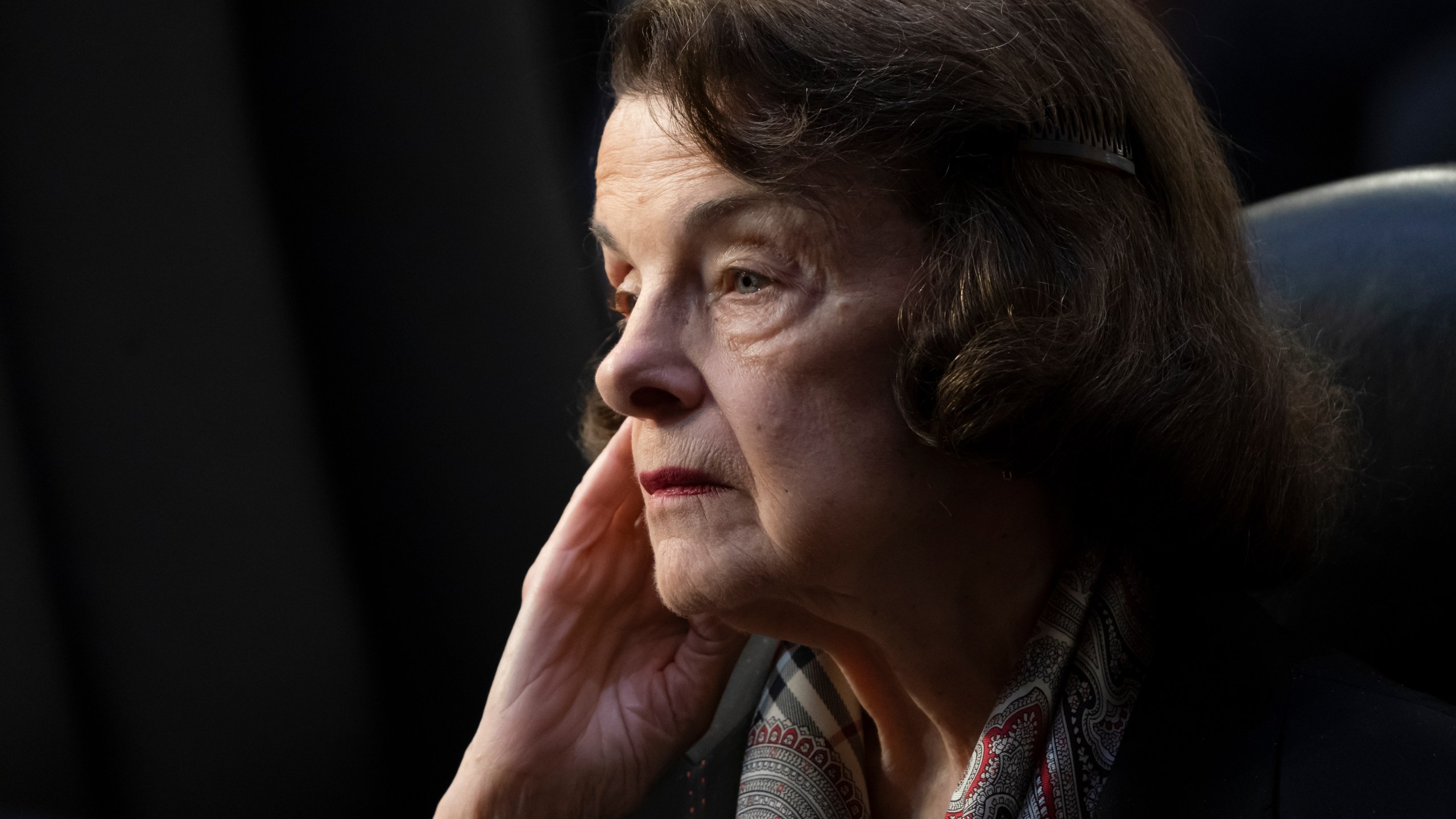 FILE - Sen. Dianne Feinstein, D-Calif., listens as the Senate Judiciary Committee begins debate on Ketanji Brown Jackson's nomination for the Supreme Court, in Washington, April 4, 2022. Democrats’ efforts to temporarily replace Feinstein on the Senate Judiciary Committee met quick opposition Monday, April 17, 2023, from some Republicans, potentially complicating the plan even as some of President Joe Biden’s judicial nominees remain on hold during her extended medical absence. Feinstein last week asked to be temporarily replaced on the Senate Judiciary Committee while she recuperates in her home state from a case of shingles. (AP Photo/J. Scott Applewhite, File)