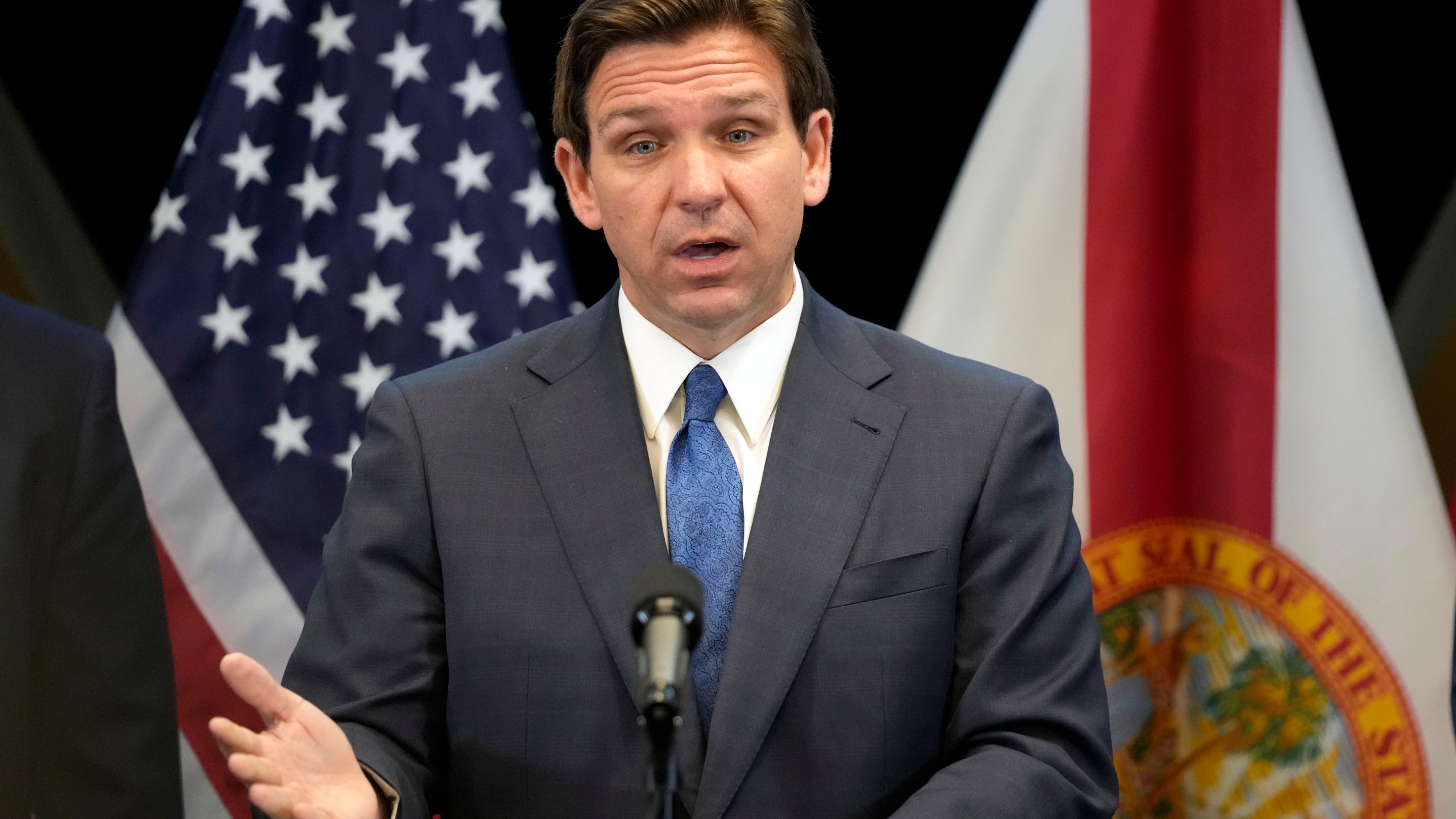 FILE - Florida Gov. Ron DeSantis speaks at a news conference at the Reedy Creek Administration Building Monday, April 17, 2023, in Lake Buena Vista, Fla. DeSantis has yet to enter the 2024 presidential race, but former President Donald Trump is aiming to drum up support in the Florida governor's backyard, securing endorsements already from about one-third of the Republicans in the state's congressional delegation. (AP Photo/John Raoux, File)