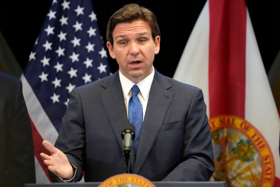 FILE - Florida Gov. Ron DeSantis speaks at a news conference at the Reedy Creek Administration Building Monday, April 17, 2023, in Lake Buena Vista, Fla. DeSantis has yet to enter the 2024 presidential race, but former President Donald Trump is aiming to drum up support in the Florida governor's backyard, securing endorsements already from about one-third of the Republicans in the state's congressional delegation. (AP Photo/John Raoux, File)