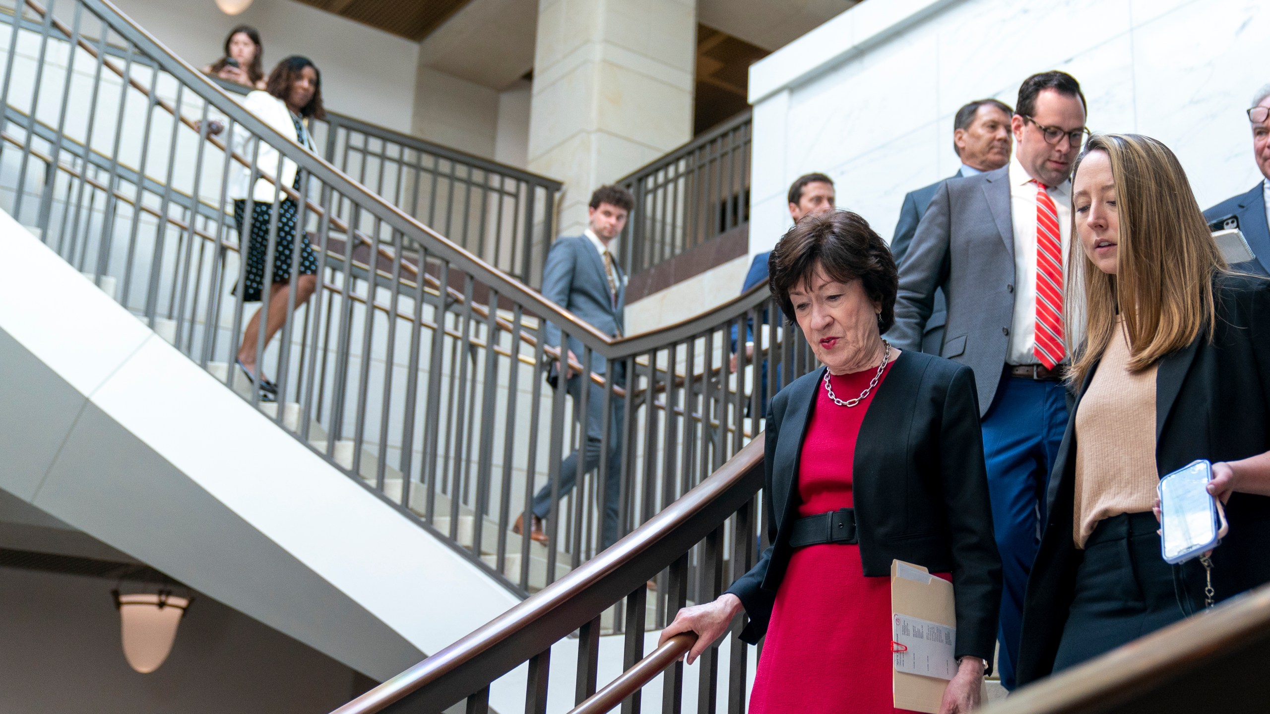 Sen. Susan Collins, R-Maine, left, arrives for a closed-door briefing about the leaked highly classified military documents, on Capitol Hill, Wednesday, April 19, 2023, in Washington. The Senate rejected a Republican effort on Wednesday, April 19, to reverse a Department of Veterans Affairs policy that has expanded some abortion services to veterans. The Senate voted 48-51 not to scrap the expanded abortion services, with Collins and Lisa Murkowski of Alaska voting with Democrats to preserve the rule. (AP Photo/Alex Brandon)