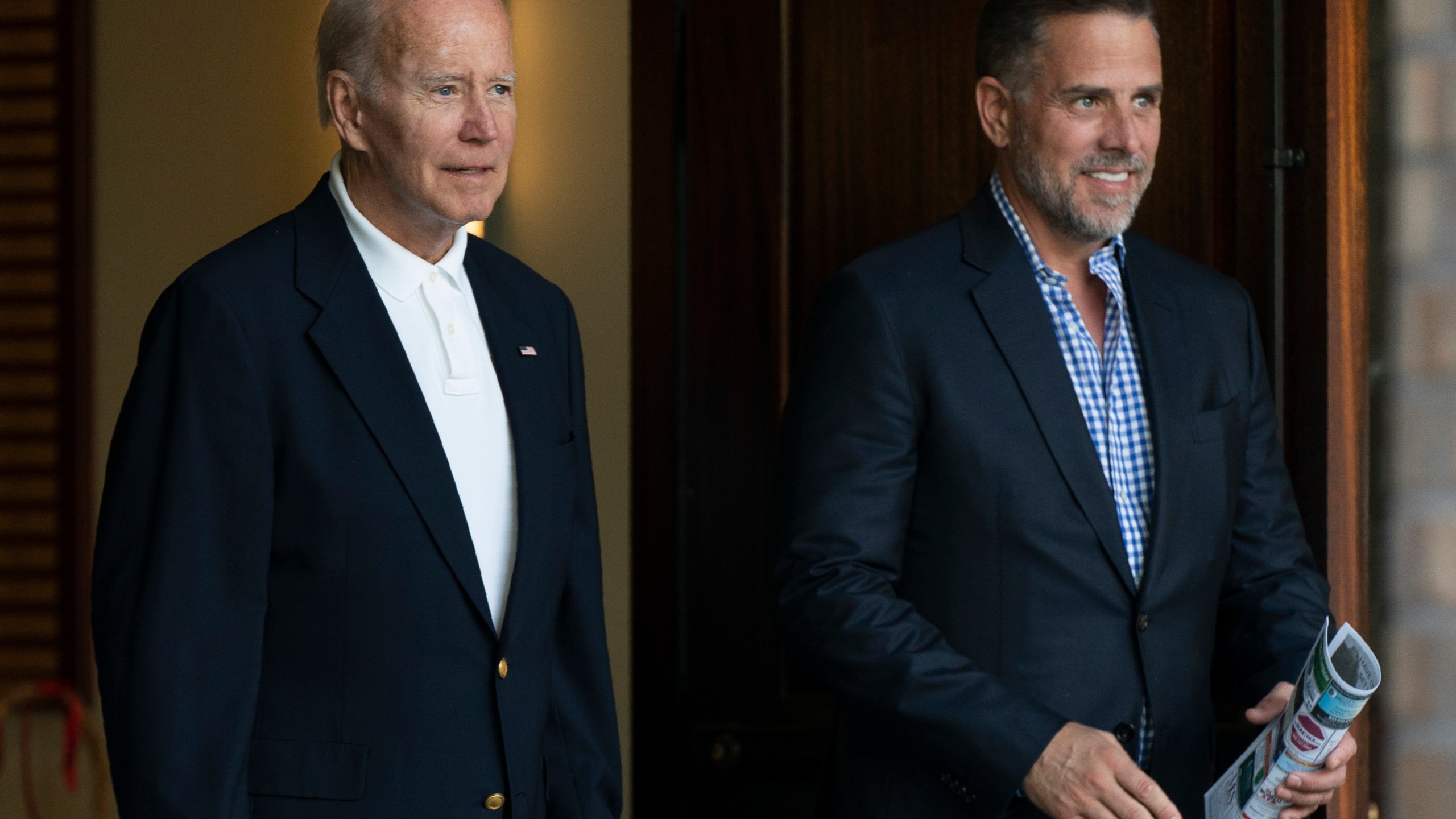 FILE - President Joe Biden and his son Hunter Biden leave Holy Spirit Catholic Church in Johns Island, S.C., after attending a Mass on Aug. 13, 2022. Biden is in Kiawah Island with his family on vacation. An IRS special agent is seeking whistleblower protection to disclose information regarding what the agent contends is mishandling of an investigation into President Joe Biden’s son, Hunter Biden. That is according to a letter to Congress obtained by The Associated Press. (AP Photo/Manuel Balce Ceneta, File)