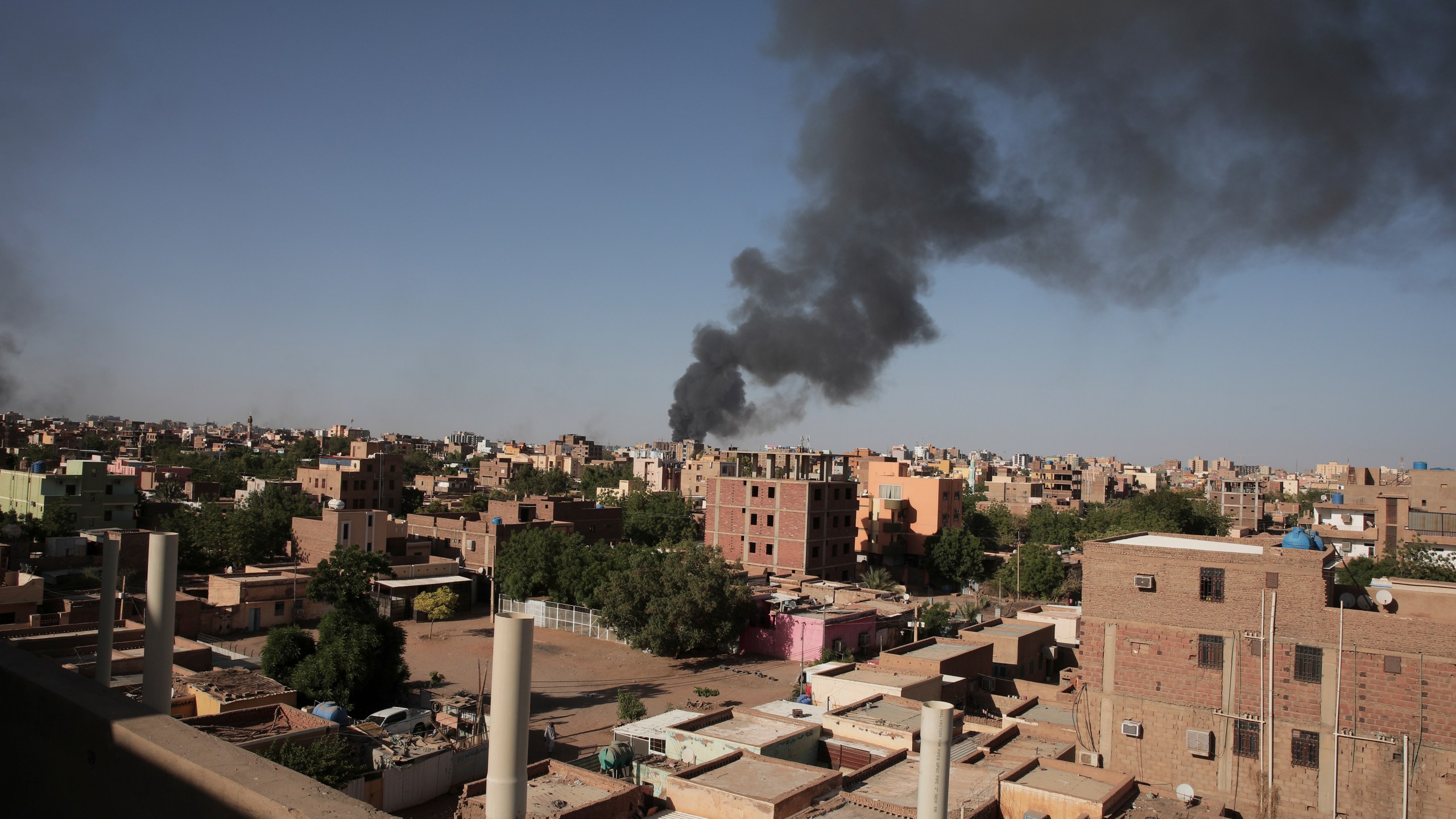 Smoke is seen in Khartoum, Sudan, Wednesday, April 19, 2023. (AP Photo/Marwan Ali)