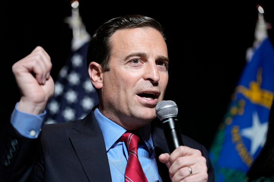 FILE - Nevada Republican Senate candidate Adam Laxalt speaksto supporters during an election night campaign event on Nov. 8, 2022, in Las Vegas. Former Nevada Attorney General Adam Laxalt will help lead a political action committee that is encouraging Florida Gov. Ron DeSantis to run for president. (AP Photo/John Locher, File)