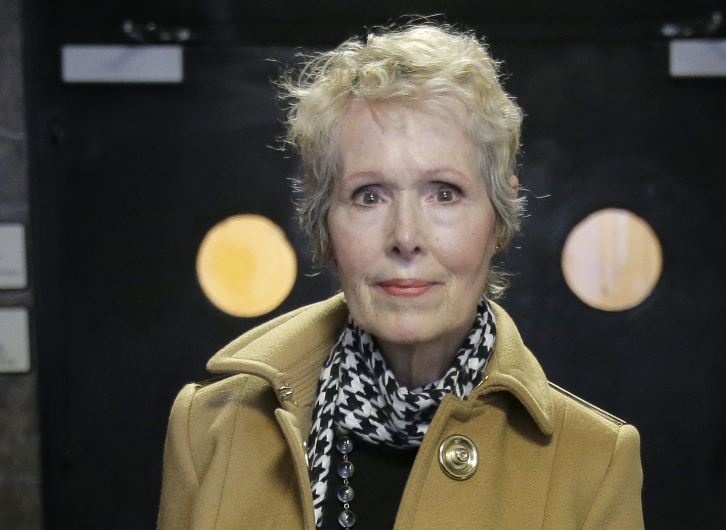 FILE - In this March 4, 2020, file photo, E. Jean Carroll arrives at court in New York. More than a dozen women have publicly accused former President Donald Trump of sexual assault and harassment, but none of those claims has gone to trial. That is about to change. The trial of a former advice columnist's rape lawsuit is due to start with jury selection Tuesday. E. Jean Carroll alleges that Trump raped her in a New York luxury department store dressing room in the mid-1990s. (AP Photo/Seth Wenig, File)