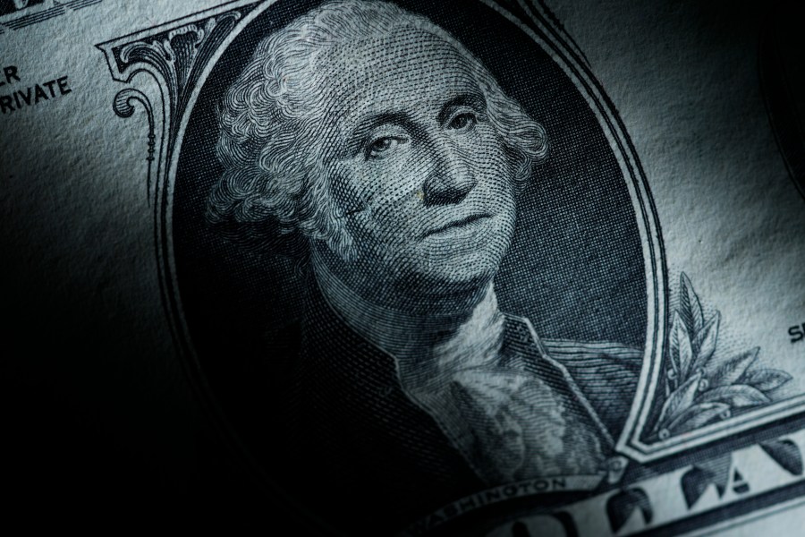 The likeness of George Washington is seen on a U.S. one dollar bill, Monday, March 13, 2023, in Marple Township, Pa. After years of paying low rates for savers, banks are finally offering better interest on deposits. Moving your savings around by opening a new account and closing an old one can seem like a hassle, but it's a use of time that can pay off. (AP Photo/Matt Slocum)