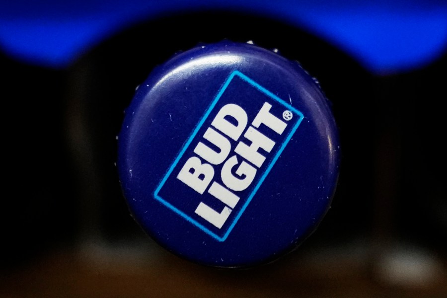 A bottle of Bud Light beer is seen at a grocery store in Glenview, Ill., Tuesday, April 25, 2023. Bud Light may have fumbled its attempt to broaden its customer base by partnering with a transgender influencer. But experts say inclusive marketing is simply good business __ and it’s here to stay. (AP Photo/Nam Y. Huh)