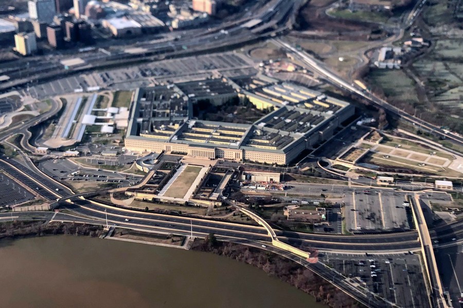 FILE - The Pentagon is seen in this aerial view made through an airplane window in Washington, Jan. 26, 2020. U.S. officials tell The Associated Press the number of reported sexual assaults across the military inched up by about 1% last year, as a sharp decline in Army numbers offset large increases in the other three services. (AP Photo/Pablo Martinez Monsivais, File)