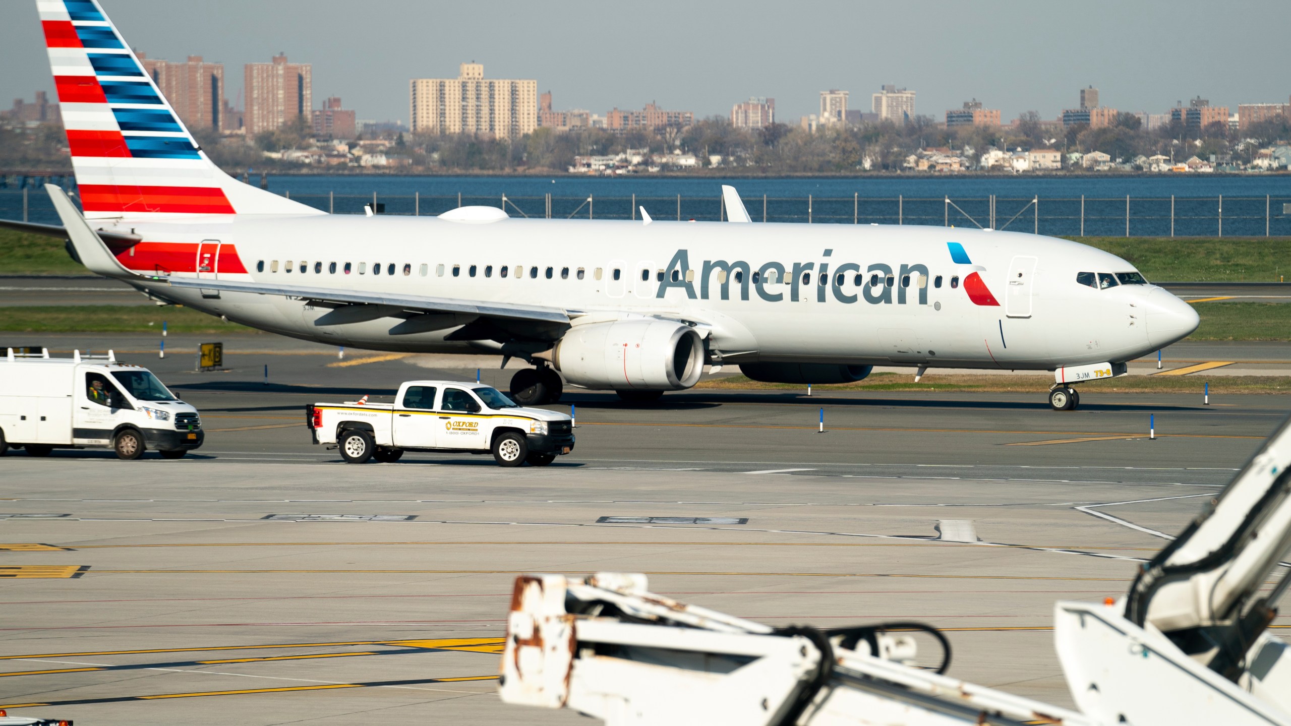 FILE - An American Airlines plane at LaGuardia Airport's Terminal B, Tuesday, Nov. 22, 2022, in New York. American Airlines reports earnings on Thursday, April 27, 2023. (AP Photo/Julia Nikhinson)