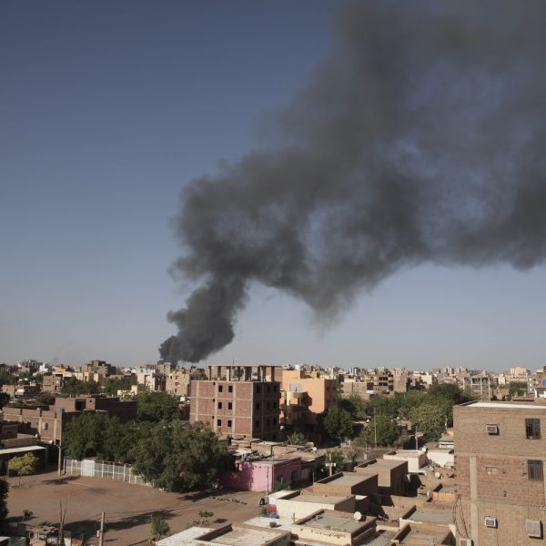 FILE - Smoke is seen in Khartoum, Sudan, Wednesday, April 19, 2023. The U.S. conducted its first organized evacuation of citizens and permanent residents from Sudan, the State Department said Saturday, April 29, two weeks into a conflict that has turned Khartoum into a war zone and thrown the country into turmoil. American unmanned aircraft, which have been keeping an eye on overland evacuation routes for days, were providing armed overwatch for the American operation, according to two people briefed on the operation who were not authorized to speak publicly. (AP Photo/Marwan Ali, File)