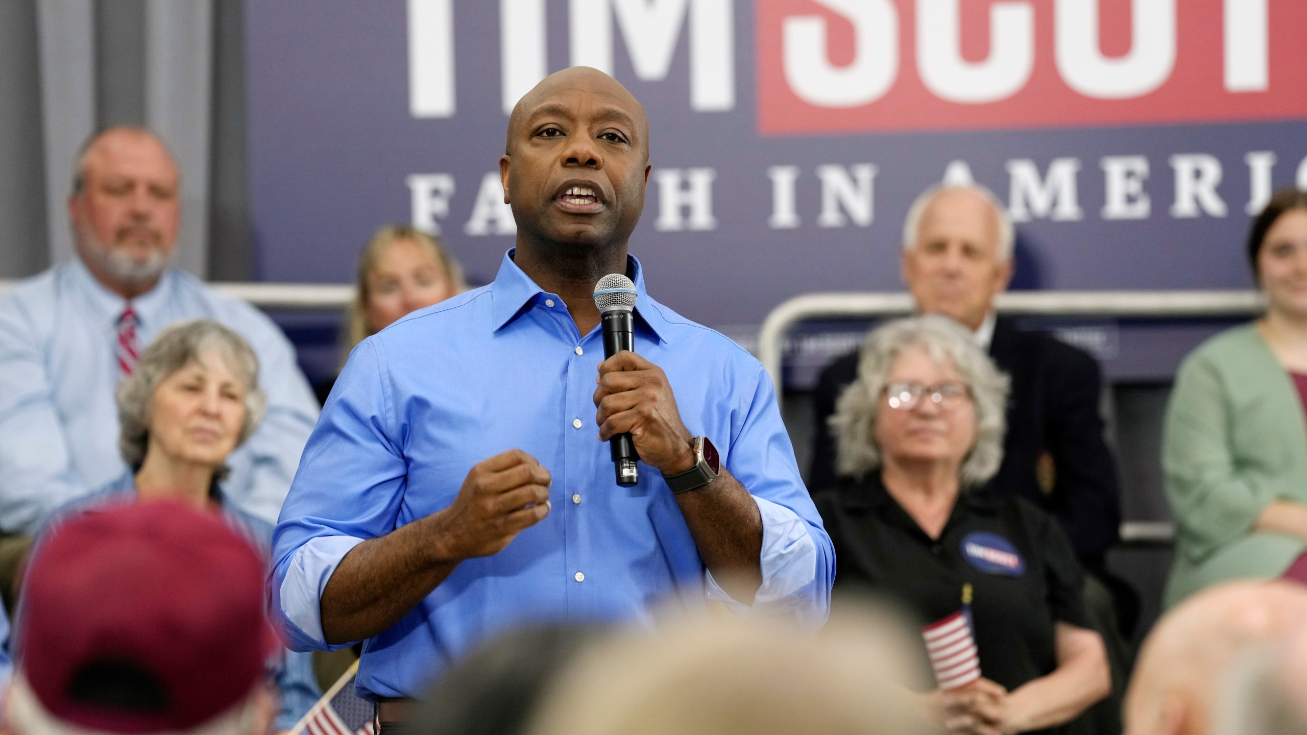 U.S. Sen. Tim Scott, R-S.C., speaks at a town hall, Sunday, April 30, 2023, in Charleston, S.C. Scott has launched an exploratory committee and says he'll announce a decision on the 2024 presidential race by the end of May. (AP Photo/Meg Kinnard)