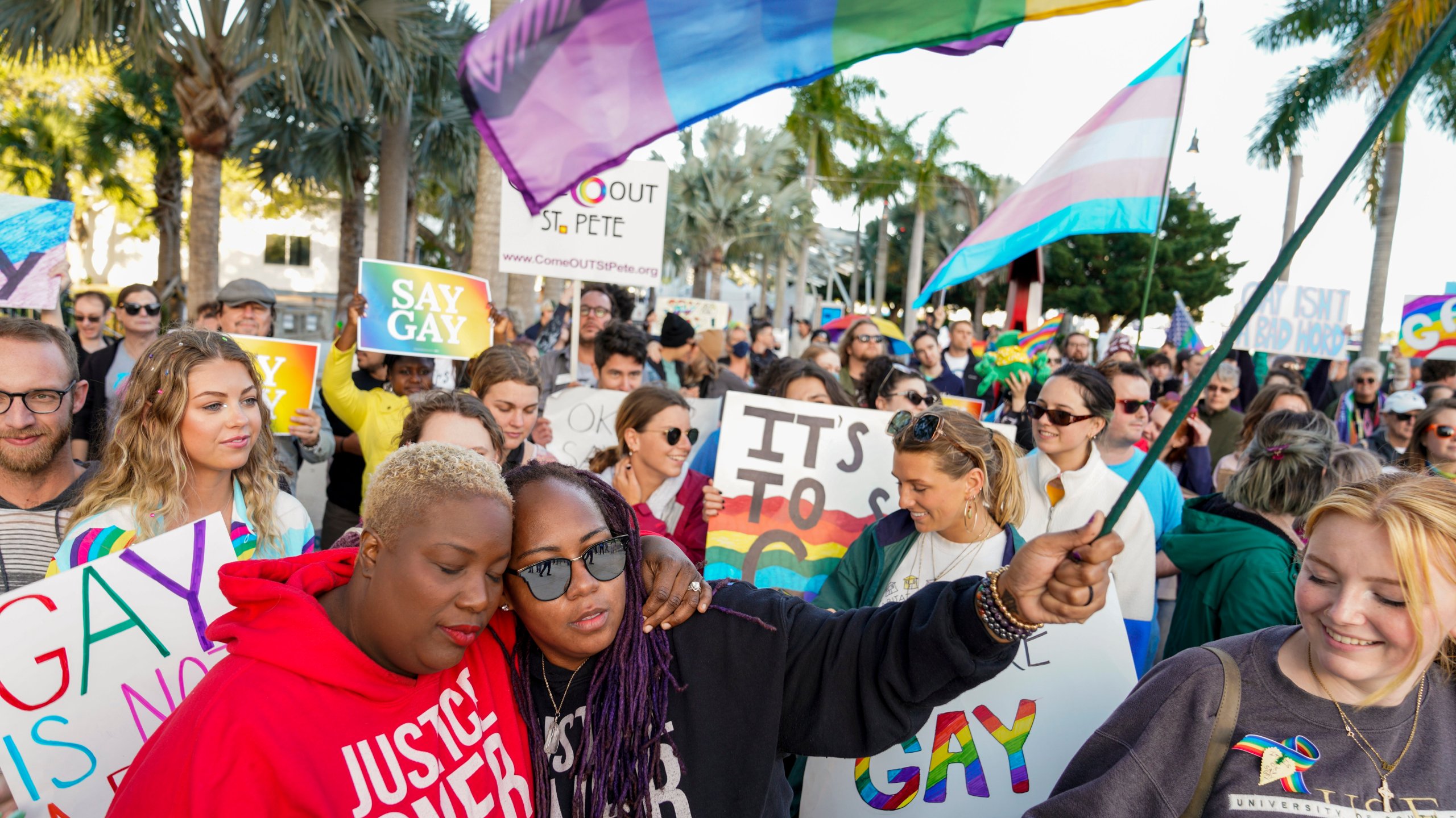 FILE - Florida House Representative Michele Rayner, left, hugs her spouse, Bianca Goolsby, during a march at city hall in St. Petersburg, Fla., on March 12, 2022, to protest the controversial "Don't Say Gay" bill passed by Florida's Republican-led legislature. While Florida has received national attention for what opponents call the "Don't Say Gay" law, the trend is national, particularly in red states. The American Civil Liberties Union is tracking nearly 470 bills it considers to be anti-LGBTQ+, most of which are in states with Republican-controlled the Legislature, such as Texas, Missouri, Florida and Tennessee.(Martha Asencio-Rhine/Tampa Bay Times via AP, File)