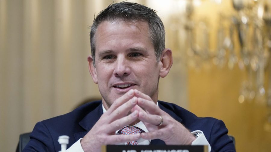 Rep. Adam Kinzinger listens as the House Select Committee investigating the Jan. 6 attack on the U.S. Capitol holds a hearing.