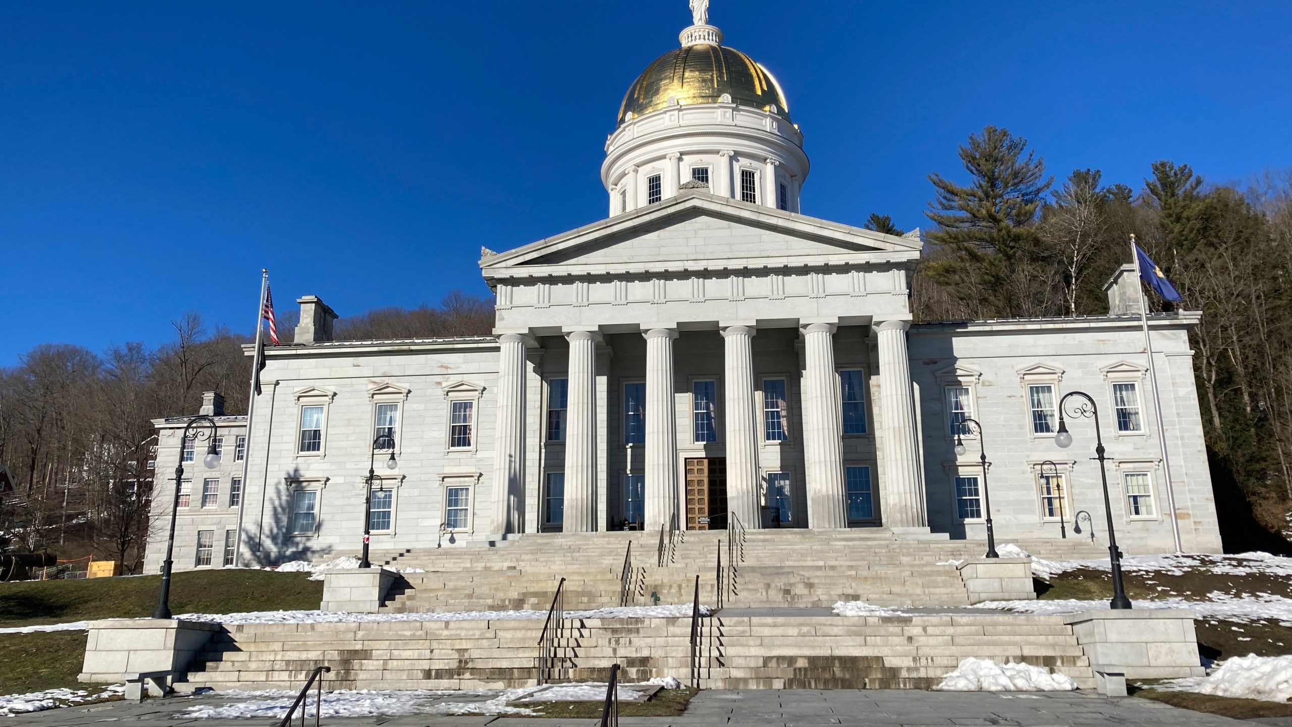 FILE - The Vermont State House stands on Feb. 14, 2023, in Montpelier, Vt. Vermont on Tuesday, May 2, became the first state in the country to change its medically assisted suicide law to allow terminally ill people from out of state to take advantage of it to end their lives. Republican Gov. Phil Scott signed the bill that removes the residency requirement for the decades-old law. (AP Photo/Lisa Rathke, File)