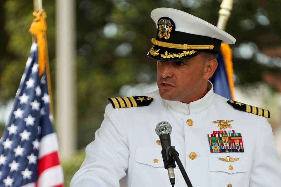 In this image provided by the U.S. Navy, Capt. Brian Drechsler, commanding officer, Naval Special Warfare Center (NSWCEN), speaks during a change of command ceremony at Naval Amphibious Base Coronado, on July 23, 2021. U.S. officials say Dreschler, who was reprimanded in connection with the death in 2022 of a Navy SEAL candidate, has been pulled out of his job about two months early.(Mass Communication Spc. 1st Class Anthony W. Walker/U.S. Navy via AP)