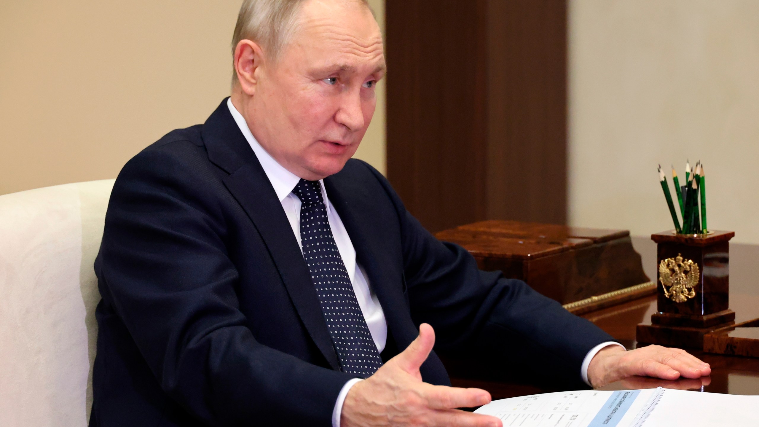 Russian President Vladimir Putin gestures while speaking to the Governor of the Nizhny Novgorod Region, Gleb Nikitin, during their meeting at the Novo-Ogaryovo residence outside Moscow, Russia, Wednesday, May 3, 2023. (Mikhail Klimentyev, Sputnik, Kremlin Pool Photo via AP)