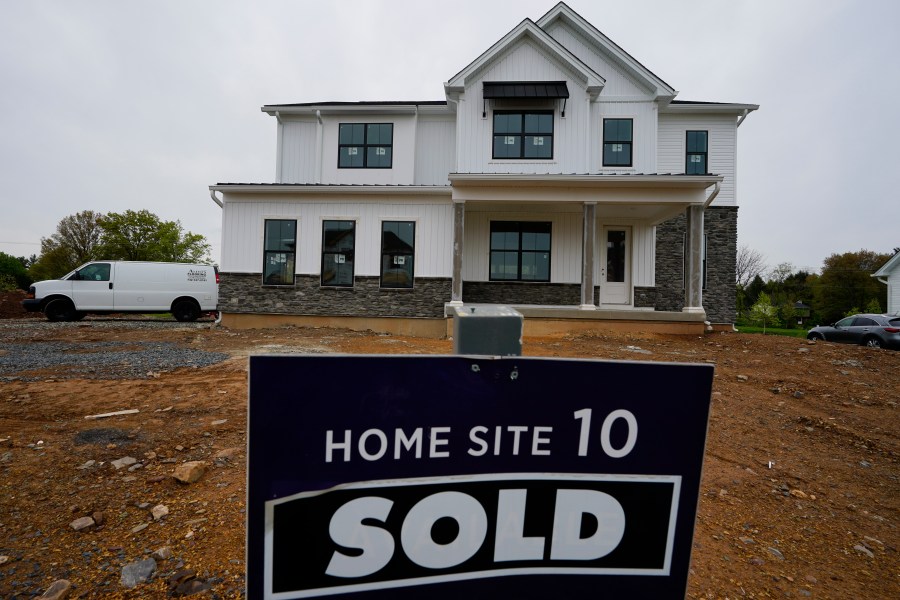 A home under construction at a development in Eagleville, Pa., is shown on Friday, April 28, 2023. Rates on credit cards, mortgages and auto loans, which have been surging since the Fed began raising rates last year, all stand to rise even more. (AP Photo/Matt Rourke)