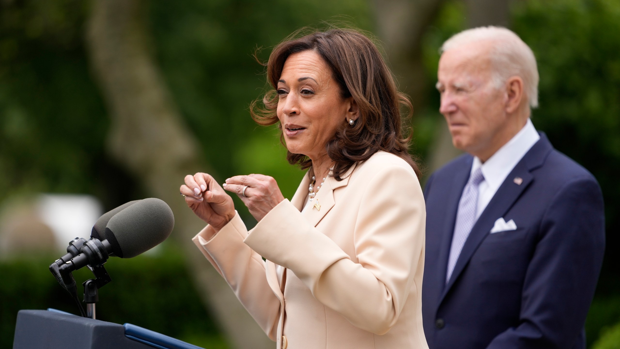 President Joe Biden listens as Vice President Kamala Harris speaks in the Rose Garden of the White House in Washington, Monday, May 1, 2023, about National Small Business Week. (AP Photo/Carolyn Kaster)