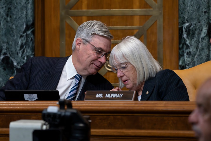 Senate Budget Committee Chairman Sheldon Whitehouse, D-R.I., confers with Sen. Patty Murray, D-Wash., right, during a hearing on the Republican proposal to address the debt limit which passed along party lines in the House last week, at the Capitol in Washington, Thursday, May 4, 2023. Senate Democrats are looking to pressure Republicans into resolving the impasse on the debt ceiling. (AP Photo/J. Scott Applewhite)