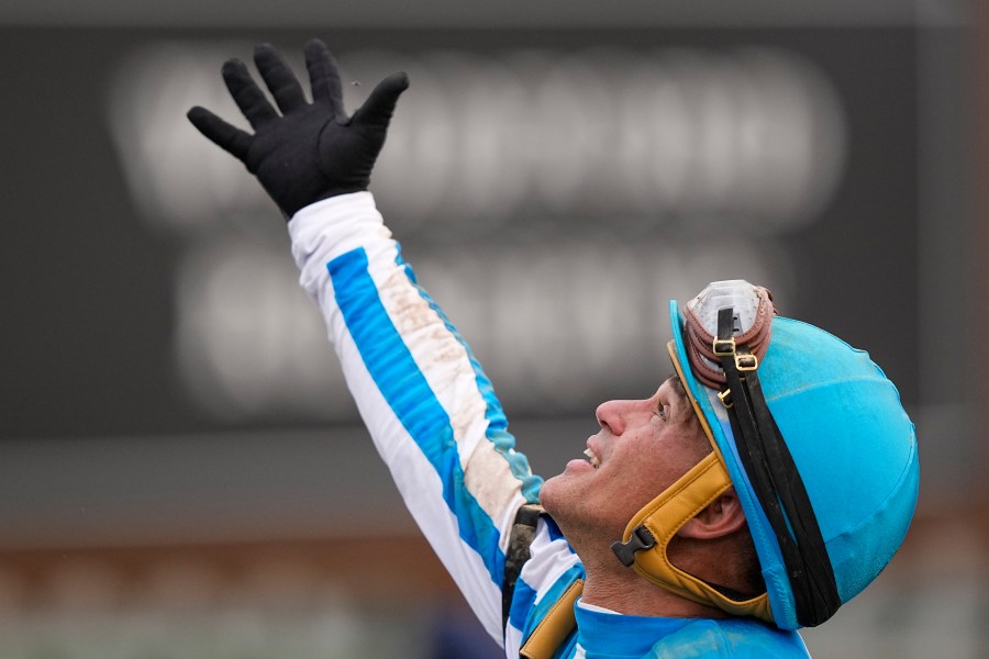 Javier Castellano celebrates in the winner's circle after riding Mage to win the 149th running of the Kentucky Derby horse race at Churchill Downs Saturday, May 6, 2023, in Louisville, Ky. (AP Photo/Brynn Anderson)