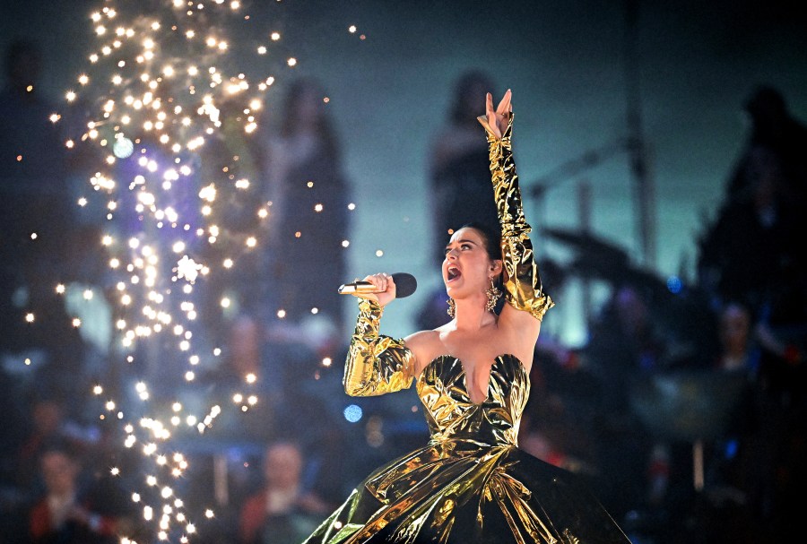 Katy Perry performs during the concert at Windsor Castle in Windsor, England, Sunday, May 7, 2023, celebrating the coronation of King Charles III. It is one of several events over a three-day weekend of celebrations. (Leon Neal/Pool Photo via AP)