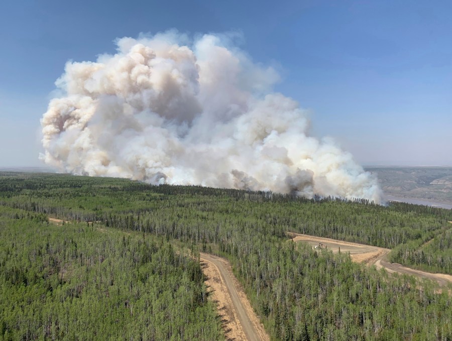 In this photo provided by the Government of Alberta Fire Service, a wildfire burns a section of forest in the Grande Prairie district of Alberta, Canada, Saturday, May 6, 2023. (Government of Alberta Fire Service/The Canadian Press via AP)