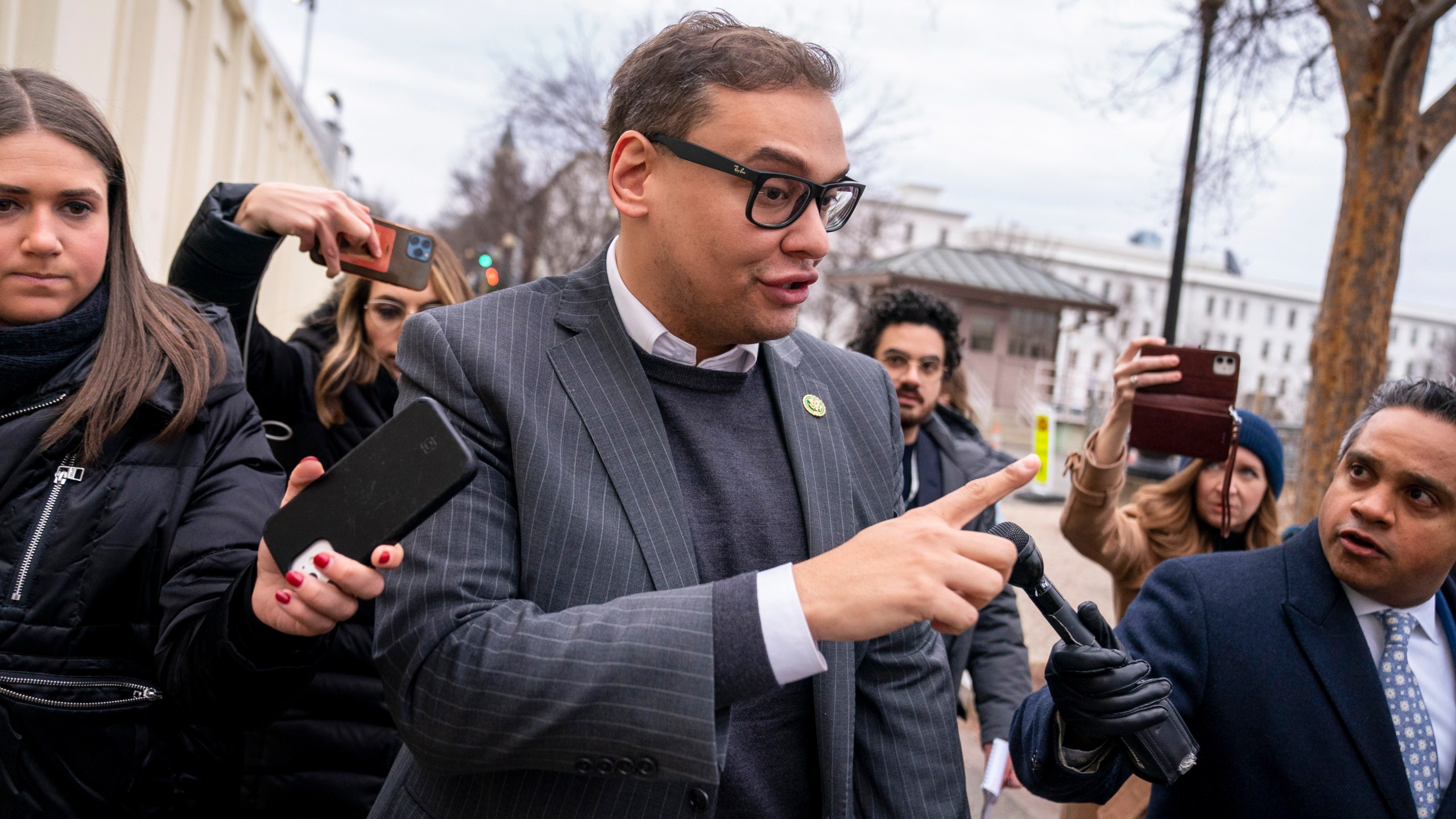 FILE - Rep. George Santos, R-N.Y., leaves a House GOP conference meeting on Capitol Hill in Washington, Jan. 25, 2023. Santos has been arrested on federal criminal charges. The indictment says Santos induced supporters to donate to a company under the false pretense the money would be used to support his campaign. (AP Photo/Andrew Harnik, File)