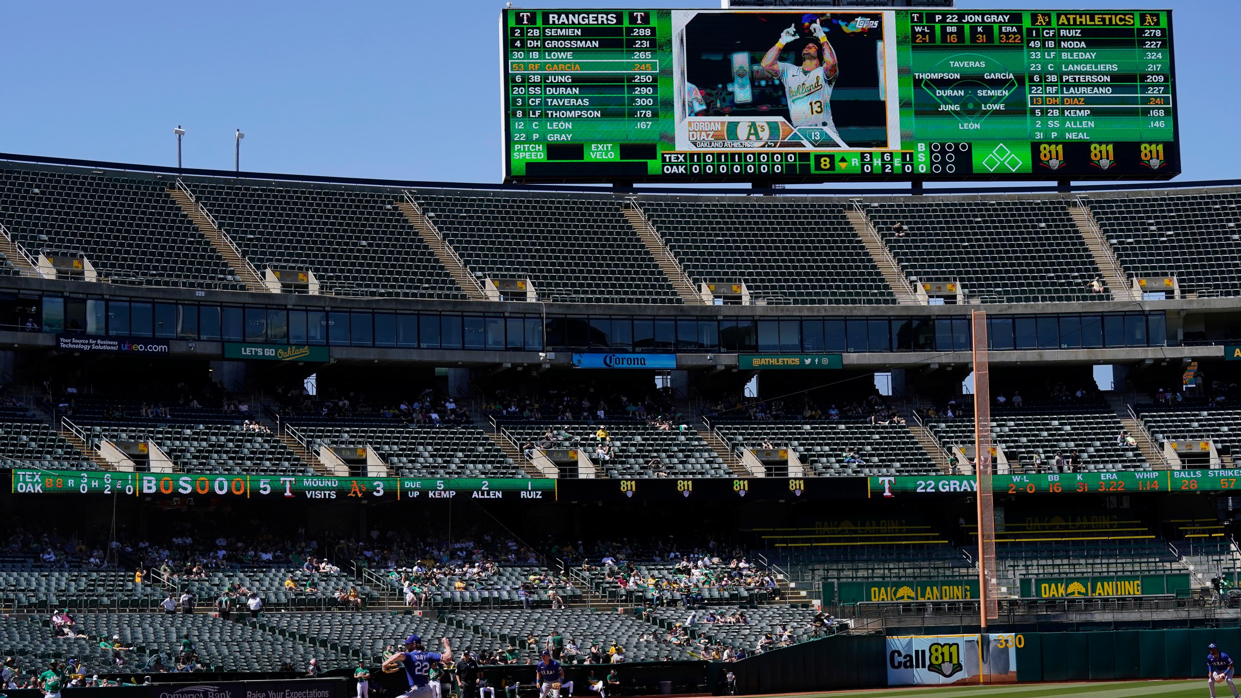 Texas Rangers pitcher Jon Gray (22) throws to an Oakland Athletics batter during the eighth inning of a baseball game in Oakland, Calif., Saturday, May 13, 2023. (AP Photo/Jeff Chiu)