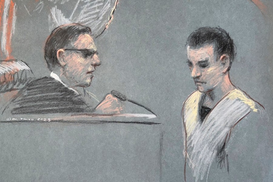 FILE - This artist depiction shows Massachusetts Air National Guardsman Jack Teixeira, right, appearing in U.S. District Court in Boston, April 14, 2023. Prosecutors say that superiors of Teixeira, charged with leaking highly classified military documents, had raised concerns internally on multiple occasions about his handling or viewing of classified information. (Margaret Small via AP, File)