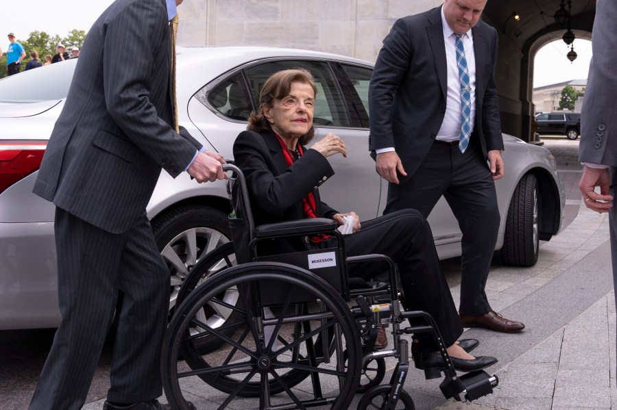 Sen. Dianne Feinstein, D-Calif., is assisted to a wheelchair by staff as she returns to the Senate after a more than two-month absence, at the Capitol in Washington, Wednesday, May 10, 2023. The 89-year-old California Democrat was out longer than expected which has slowed the push to confirm President Joe Biden's judicial nominees. (AP Photo/J. Scott Applewhite)