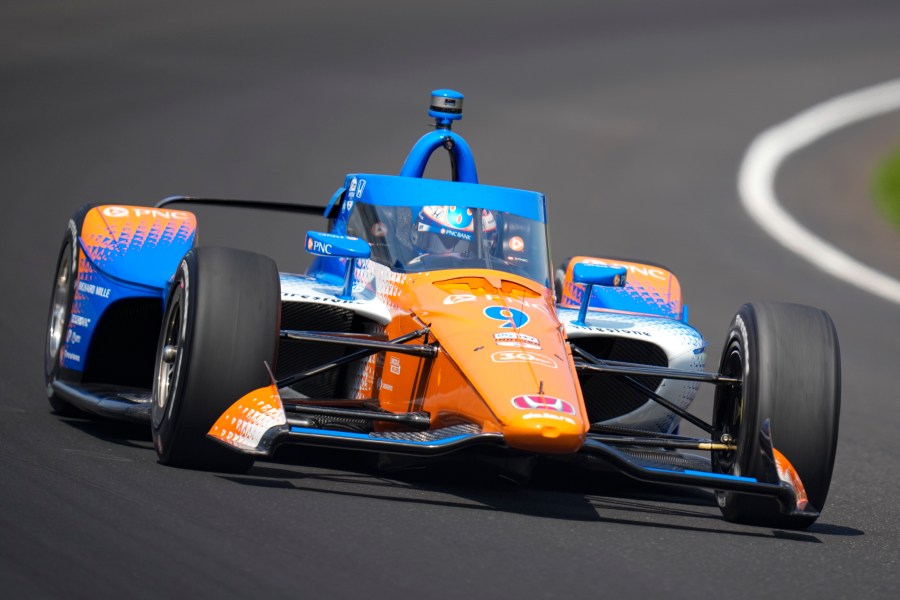 Scott Dixon, of New Zealand, drives through the first turn during qualifications for the Indianapolis 500 auto race at Indianapolis Motor Speedway in Indianapolis, Saturday, May 20, 2023. (AP Photo/Michael Conroy)